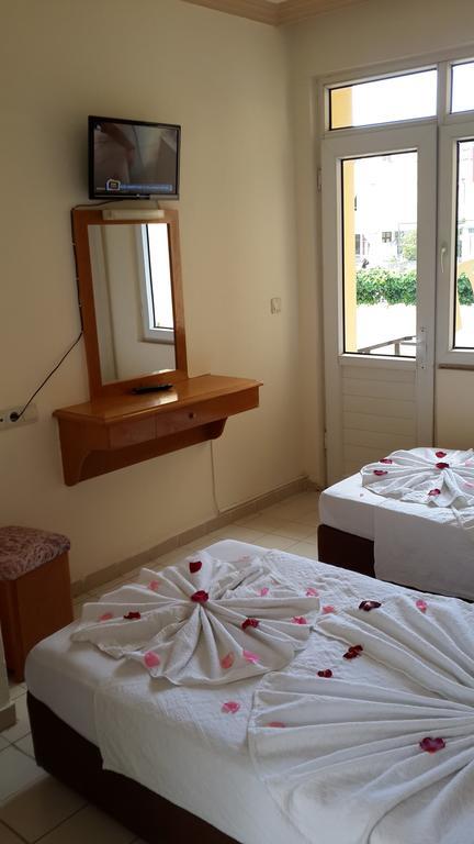 Caner Hotel Kemer Quarto foto