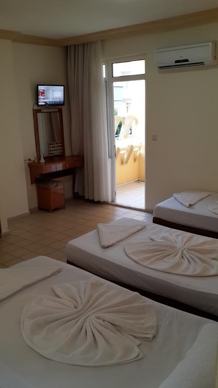 Caner Hotel Kemer Quarto foto