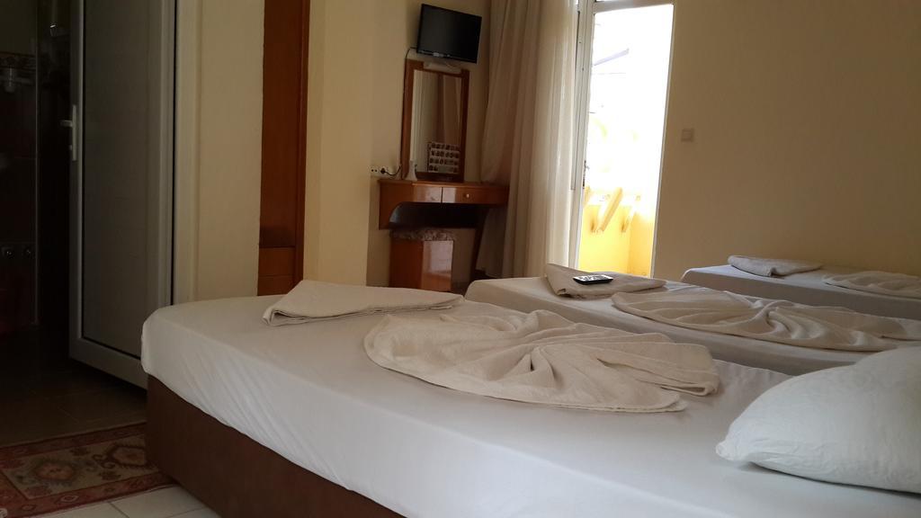 Caner Hotel Kemer Quarto foto